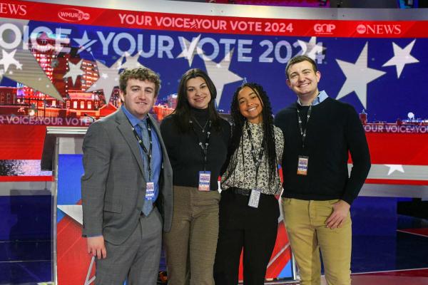 Student ambassadors at the stage of the 2024 debate