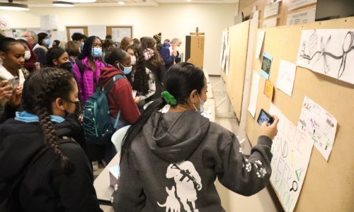 Students admire Access Academy showcase work