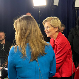 Elizabeth Warren is interviewed in the spin room