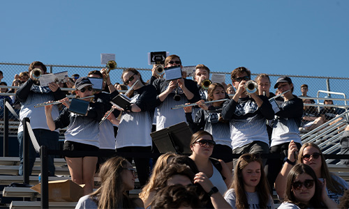Pep band plays at an athletics game