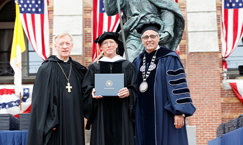 Fr. Columba poses with Abbott Mark and Dr. Favazza