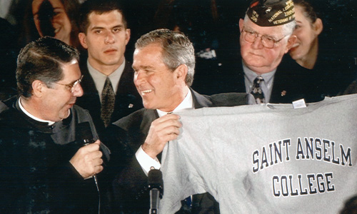 President George W. Bush holds Saint Anselm College shirt