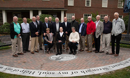 Members of the class of 1969 gather for a photo