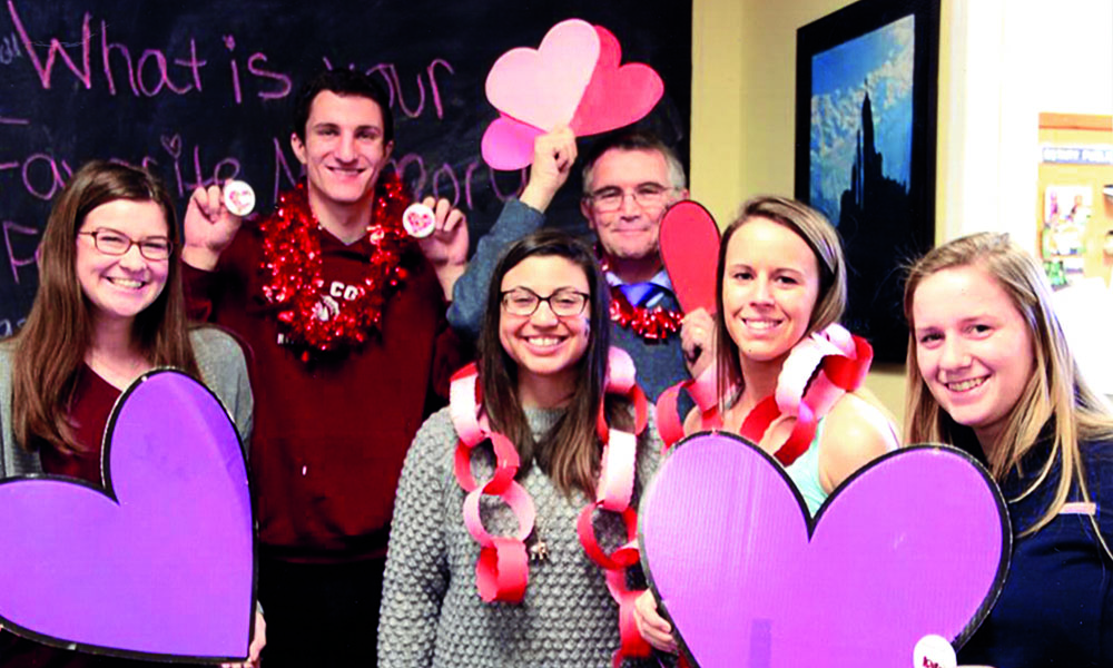 From left, Maggie O’Connor ’19, Luke Testa ’19, Nicole Lora ’06, Forbes, Maggie Walker ’17, and Cara Onyski ’19.