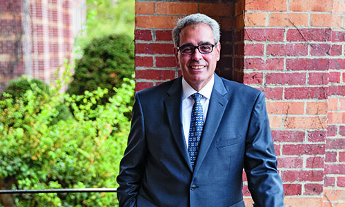 Dr. Favazza in front of Alumni Hall