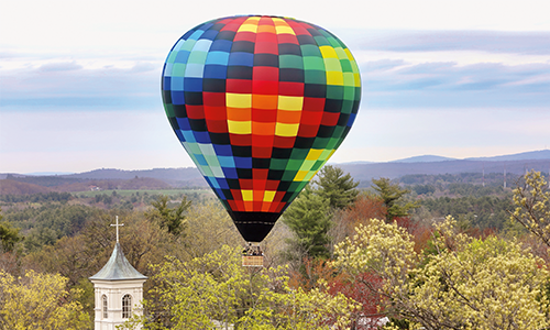Hot air balloon floats above campus