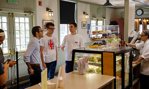 students waiting in line to order food