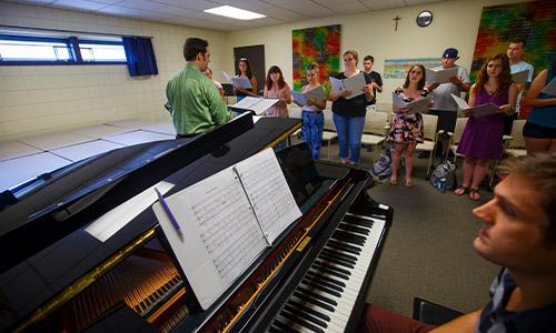 student playing the piano