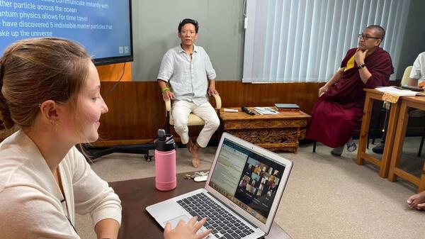 Emma Goulet teaching physics to Buddhist monks 