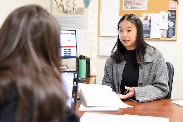 Winter helping a student during a one-on-one research appointment