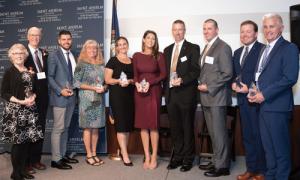 Nine Anselmian award winners pose for a photo