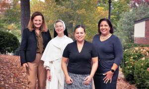 From left: Jennifer L. (Connor) Parent ’89, Sr. Elinor Gardner O.P. ’99, Xiorlivette “Xiorli” C. (Santamaria) Bernazzani ’99, and Marilou E. Watson. Photo by Kevin Harkins