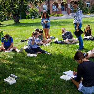 Students in class on alumni quad