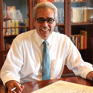 President Favazza at his desk