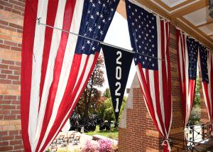 Class of 2021 pennant hanging on Alumni Hall