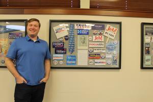 O'Neill stands next to one of the exhibits he created