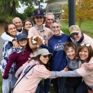 Family embracing at Family Weekend