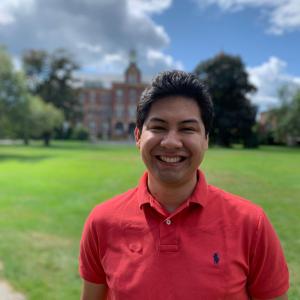 Roque Otazo standing on Alumni Quad