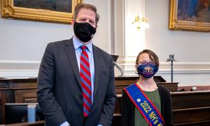 NH kid governor poses with Governor Sununu in the NH state house