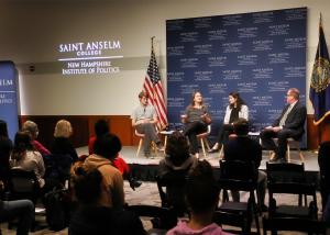 Journalists speak on stage