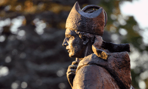 St. Benedict statue at sunset