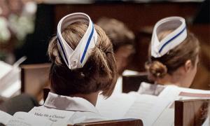 Nurses in uniform at their pinning ceremony