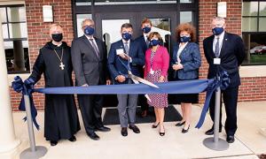 Members of the College at the ribbon cutting for Savard