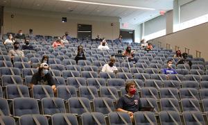 Students in a distanced class in Melucci