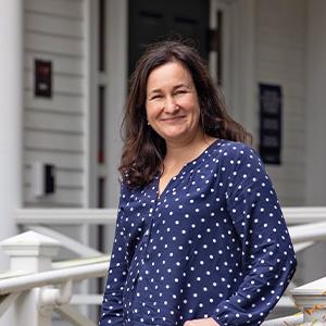 Sara Smits Keeny in front of Collins House