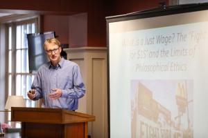 Kyle Hubbard presenting his project in the library