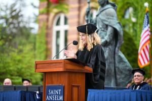 Lauren Chooljian ’10 giving the Commencement address in May 2024