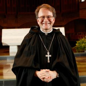 The new abbot, Br. Isaac Murphy, O.S.B. standing in the Abbey Church