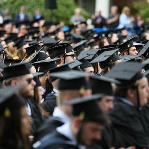 Graduates seated at a commencement ceremony
