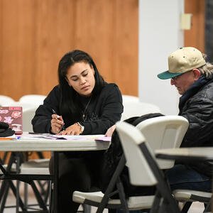 Students giving tax assistance