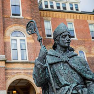 Statue in front of alumni hall