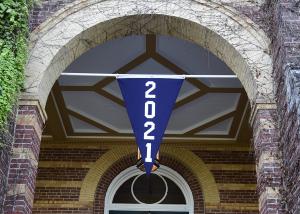 2021 pennant hanging on alumni hall