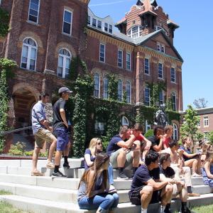 Students in front of iconic Alumni Hall for Transitions Orientation Part I