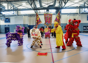 students wear cultural costumes