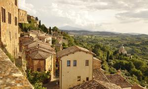 houses on the edge of a hill in italy