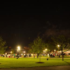 gathering on the lower quad at night