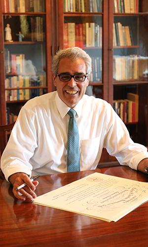 President Favazza at his desk