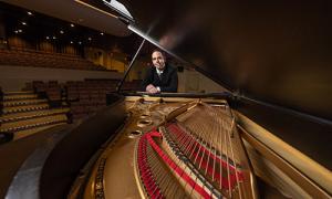 Sean Parr behind a piano
