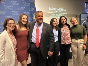 Chris Christie stands for a photo op with NHIOP Student Ambassadors