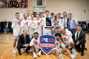 SAC Men's Basketball Team with NE10 Championship Trophy