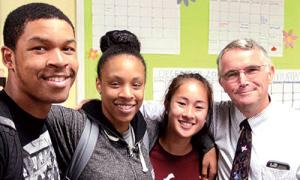 Dan Forbes standing next to students Tyler Lindsay ’16, Raquel Johnson ’16, Nancy Nguyen ’16