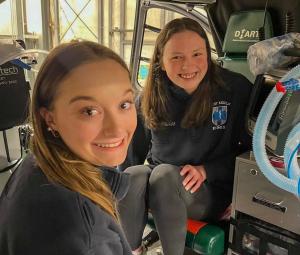 Megan Wozniak ’25 and Gabrielle Constantine ’24 in their EMT uniforms