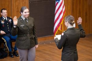 ROTC student swearing her oath to the U.S.