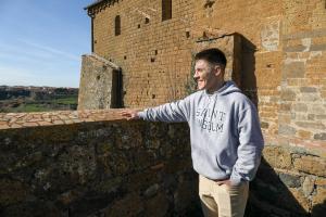 Jackson Kupferschmid ’25 enjoys a different kind of Hilltop view in Tuscania.
