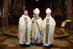 The Reverend Fr. Titus (Michael) Phelan, O.S.B. ’12, left, with The Most Reverend Peter A. Libasci, Bishop of Manchester, and The Right Reverend Mark A. Cooper, O.S.B. ’71. Photo by Kevin Harkins