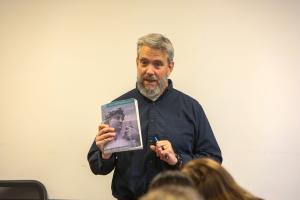 Philosophy Professor Thomas Larson teaches students in his Ethics in Great Books class held this semester.